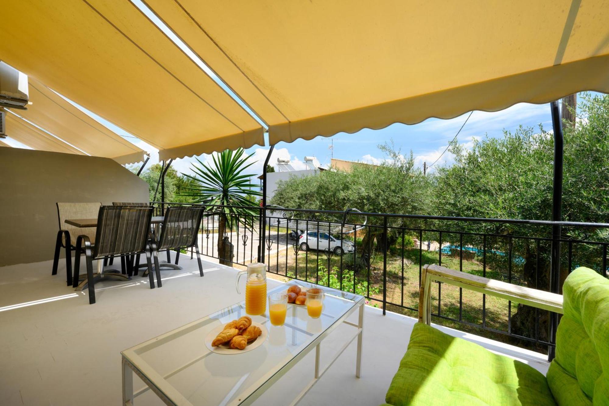 Olive Grove Poolside Apartments Benitses  Exterior photo