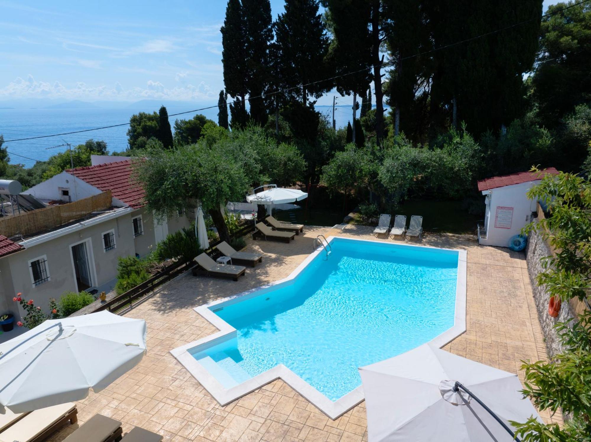 Olive Grove Poolside Apartments Benitses  Exterior photo